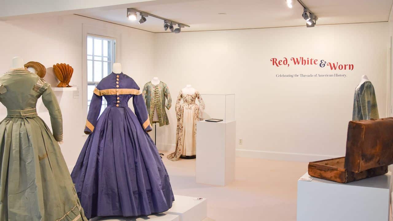 Historic garments displayed in Red, White & Worn.